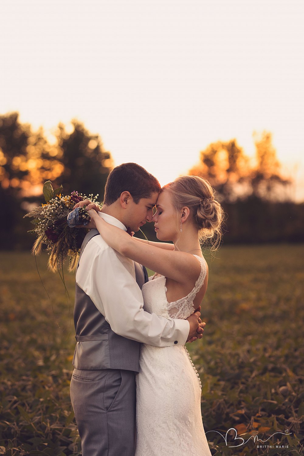 Bride Groom Sunset Embrace Weddings amazing wedding photo, backyard wedding, best macomb county photographer, bride and groom, dream wedding, michigan wedding, michigan wedding photographer, michigan wedding photography, photography by brittni marie, real wedding, sunflowers, sunset wedding