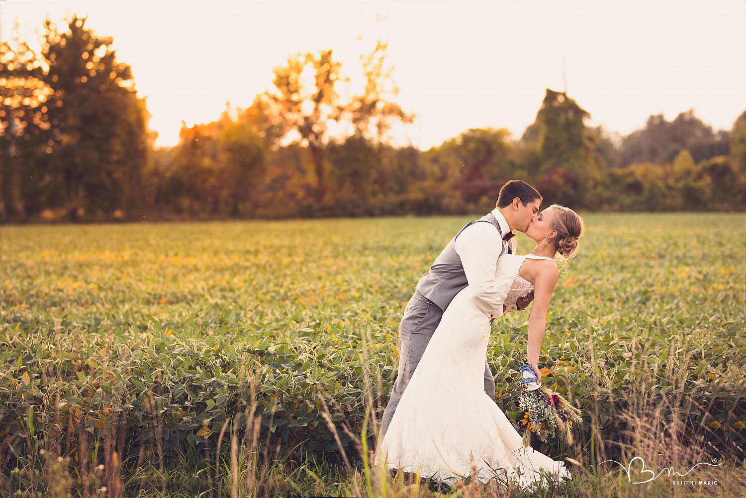 Bride Groom Sunset Kiss Weddings amazing wedding photo, backyard wedding, best macomb county photographer, bride and groom, fall wedding, michigan wedding, michigan wedding photographer, michigan wedding photography, photography by brittni marie, real wedding, sunflowers, sunset wedding